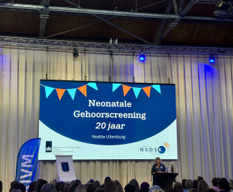 Foto van de powerpoint presentatie tijdens het event