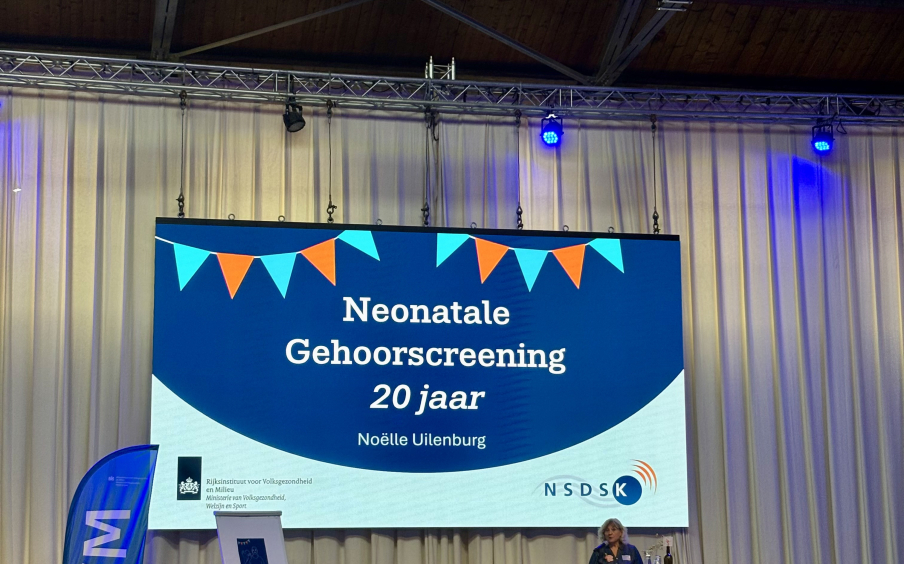 Foto van de powerpoint presentatie tijdens het event