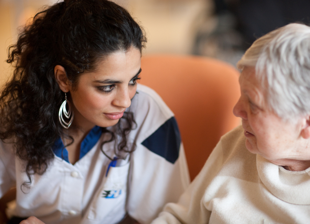 Stockfoto zorgmedewerker en cliënt